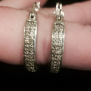 Silver hoop earrings with small diamonds